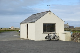 The old "terminal building" was a shed comprising a bench seat, set of bathroom scales, and a desk for the airfield radio operator